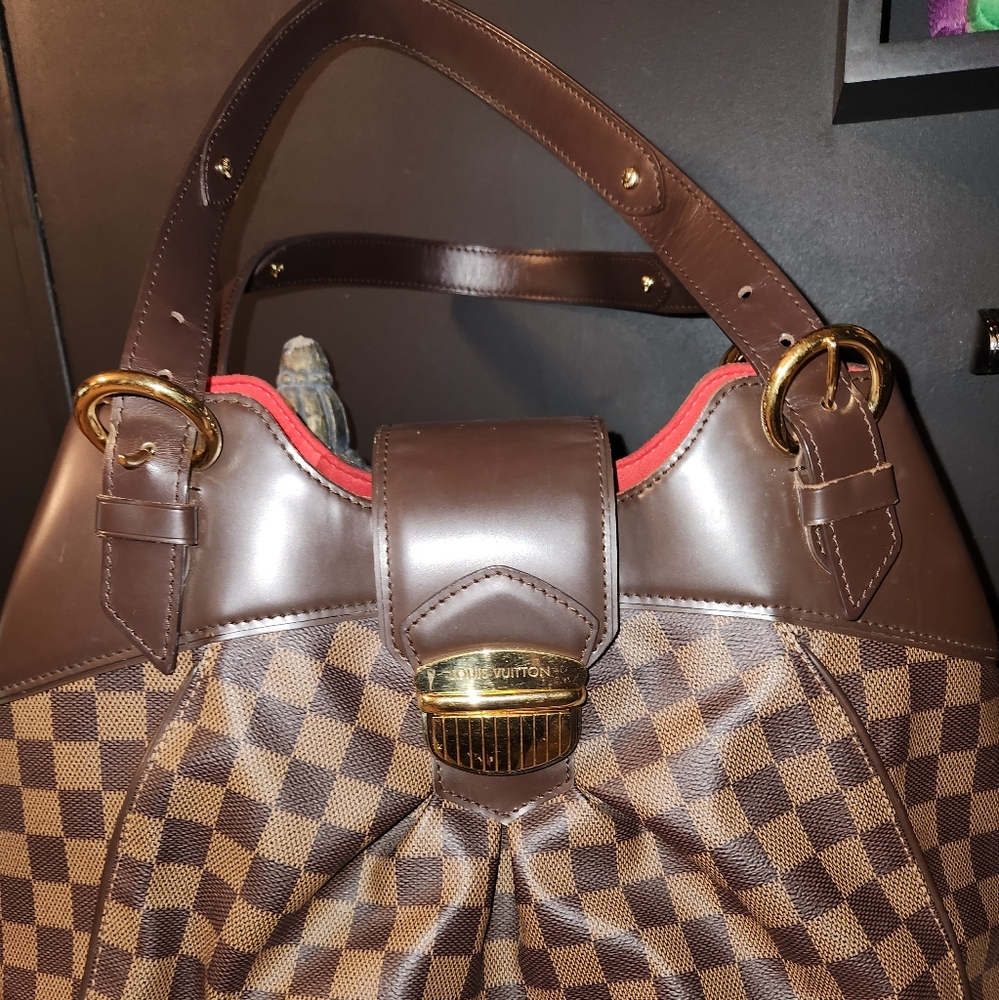 LOUIS VUITTON SISTINA HANDBAG